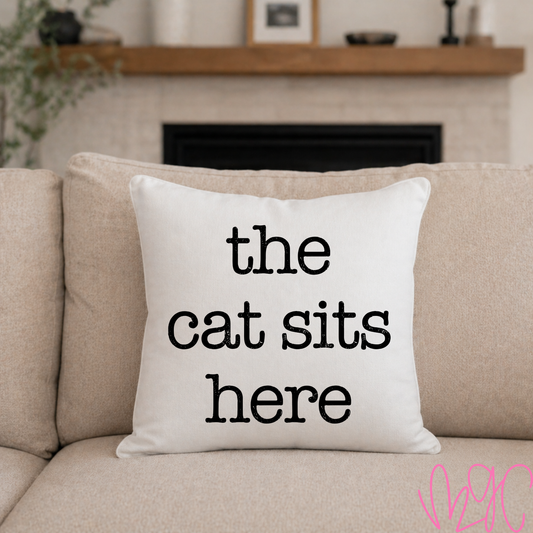 The Cat Sits Here Throw Pillow